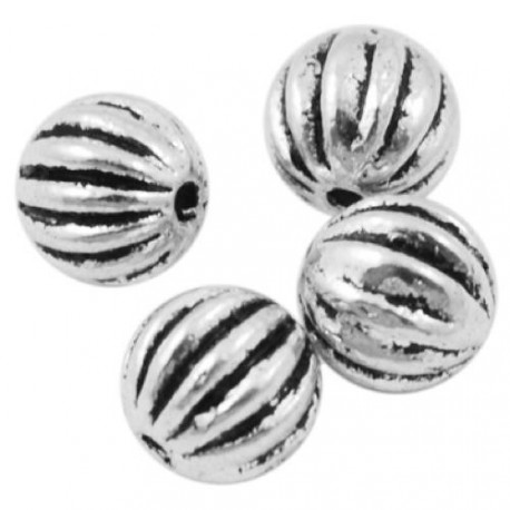 Perle de métal ronde décorée avec traits